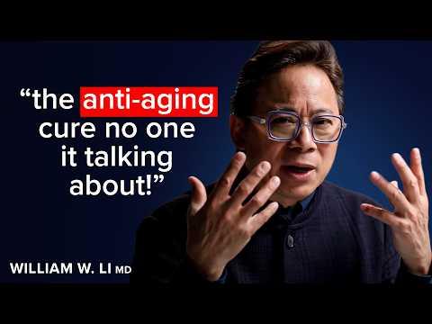 Colorful array of fresh whole foods including berries, leafy greens, and other nutrient-dense ingredients arranged on a wooden table